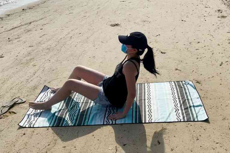 Using the Nomadix towel (71 x 30 inches) while at the beach.
