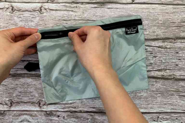 The PackTowl Personal's storage pouch is lightweight with good quality zippers.