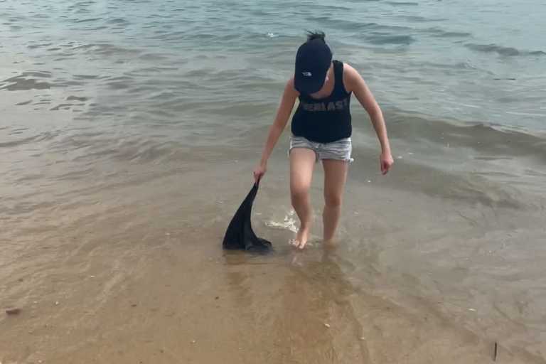 Here's a picture of me testing the Rainleaf Microfiber Towel with seawater.