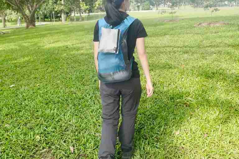 I clipped the PackTowl Personal towel inside the storage pouch to my daypack.
