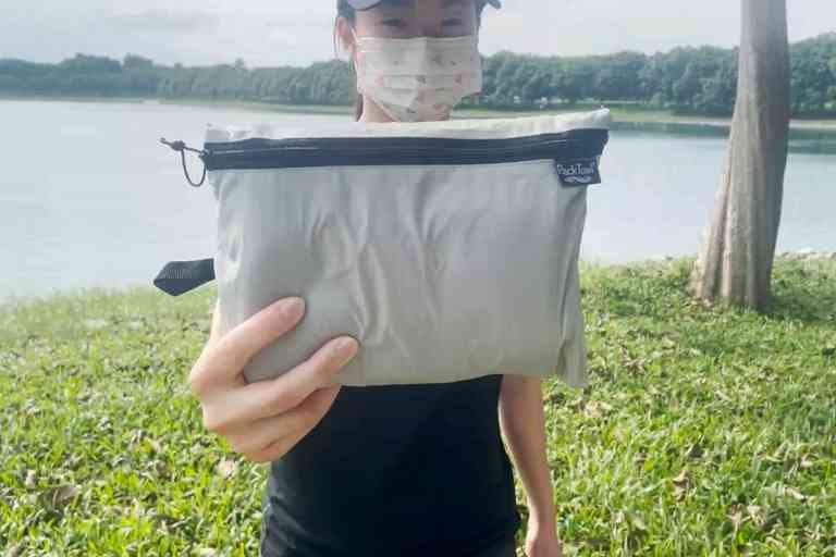 The PackTowl Personal in its storage pouch.