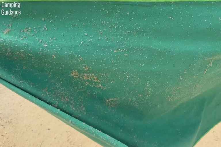 Sand grains stuck to the Wise Owl towel while at the beach (before shaking).