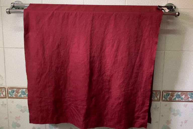 The Matador NanoDry towel, one of my best camping towels and also one of my best backpacking towels in a Shower size.
