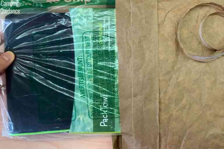 Taking the unopened PackTowl Personal out of an Amazon packaging.