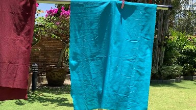 Drying the Sea to Summit AirLite Towel outdoors.