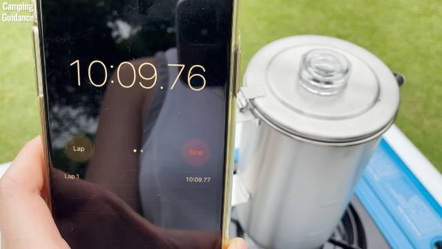 Timing how long it takes for the water to boil and perk in the Stanley Camp Percolator.