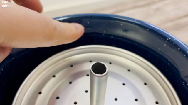 The inner percolator of the GSI Outdoors Enamelware 8-Cup Percolator inside the coffee pot.