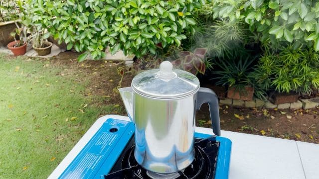 Steam coming out of the spout of the Primula Today Aluminum 9-Cup Percolator.