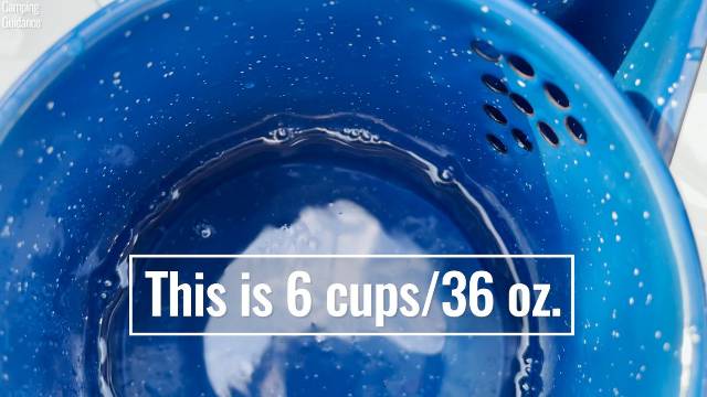 Filling the GSI Outdoors Enamelware 8-Cup Percolator with 36 ounces of water.