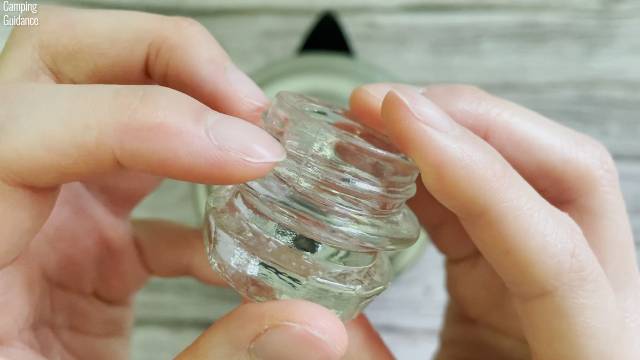 The glass rim of the perk knob that keeps scraping against the stainless steel of the Coleman 12-Cup Percolator.