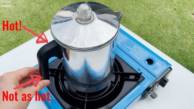 Me explaining the heat-resistance of the handle of the Primula Today Aluminum 9-Cup Percolator.