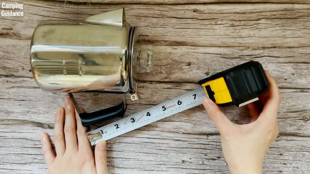 Measuring the size of the handle of the GSI Outdoors Glacier 3-Cup Percolator. (2.5 inches)