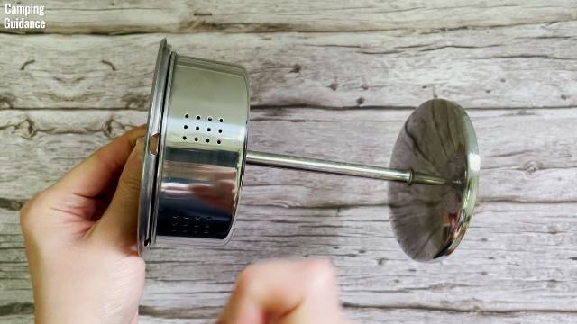 What the filter basket, stem, base and spreader of the Coletti Bozeman Camping Coffee Percolator look like.