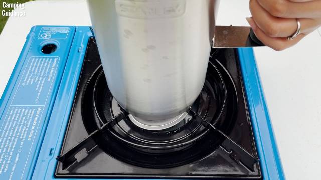 Placing the Stanley Camp Percolator on my Coleman Portable Butane Stove.