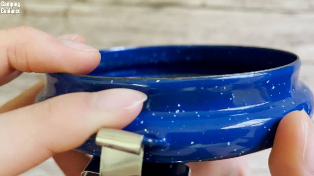 Slight rust forming on the rim of the lid of the Stansport Enamel 8-Cup Percolator.