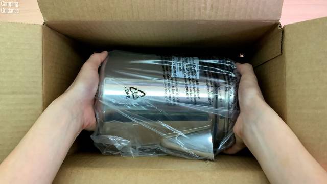 Taking the Coleman 12-Cup Stainless Steel Percolator out of the Amazon box.