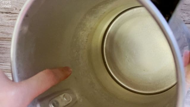 Water stains on the coffee pot of the Primula Today Aluminum 9-Cup Percolator.