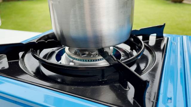 Using medium to medium low heat to heat the water and perk the coffee in the Stanley Camp Percolator.