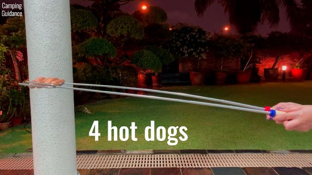 Here’s how much the Carpathen Campfire Roasting Sticks flexed with 4 hot dogs on it.