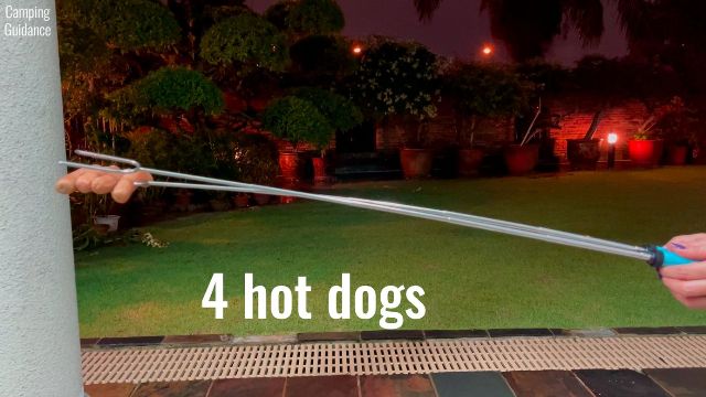 Here’s how much the Jolly Green Marshmallow Roasting Sticks flexed with 4 hot dogs on it.