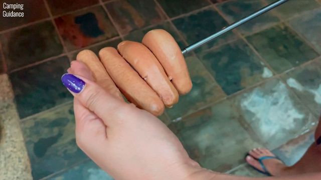 Here’s a photo of me putting 4 hot dogs on the Briout Marshmallow Roasting Sticks.