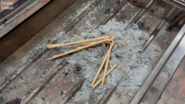 Here’s the bamboo marshmallow roasting stick broken and thrown into the firepit.