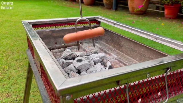 Here's a photo of me roasting hot dogs with the Carpathen Campfire Roasting Sticks.