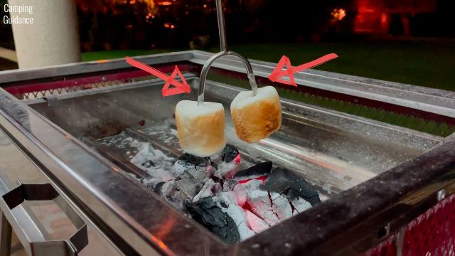 Here’s a photo of me roasting marshmallows with the Briout Marshmallow Roasting Sticks and hanging them downwards.
