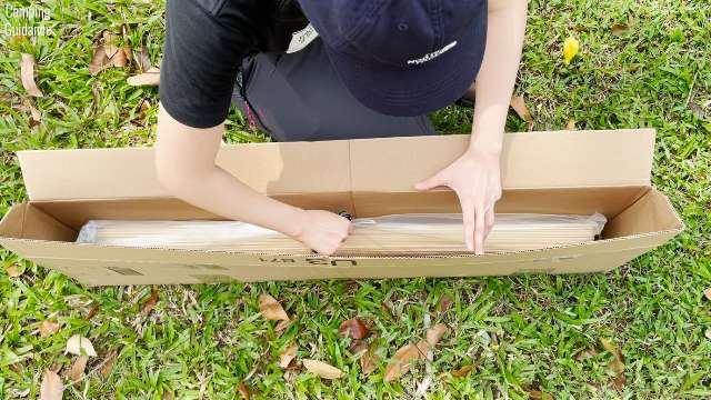 This is a photo of me taking out the bamboo marshmallow roasting sticks from the Amazon box.