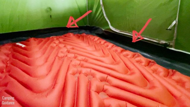 This picture shows there's a little bit of leftover space for gear inside the Coleman 2-Person Sundome Tent, even with a Klymit Double V Insulated Sleeping Pad.