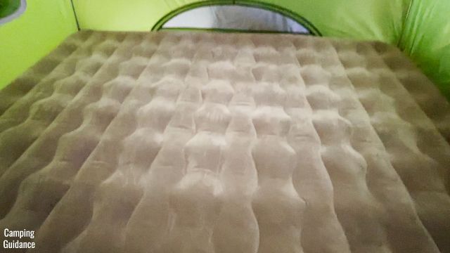 This is a picture of the Etekcity Upgraded Camping Air Mattress in a Queen size inside a Coleman 2-Person Sundome Tent.