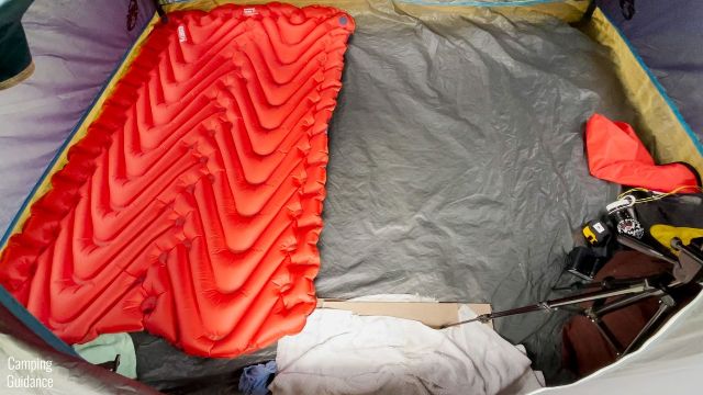 This is a Klymit Double V Insulated Sleeping Pad placed vertically inside a Coleman 4-Person Dome Tent.