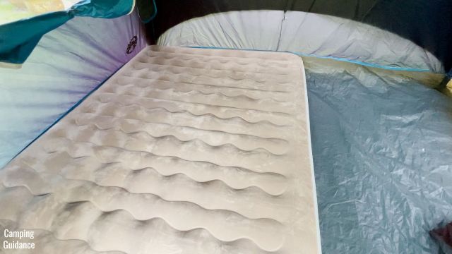 This is what the Etekcity Upgraded Camping Air Mattress in a Queen size looks like inside a Coleman 4-Person Dome Tent.