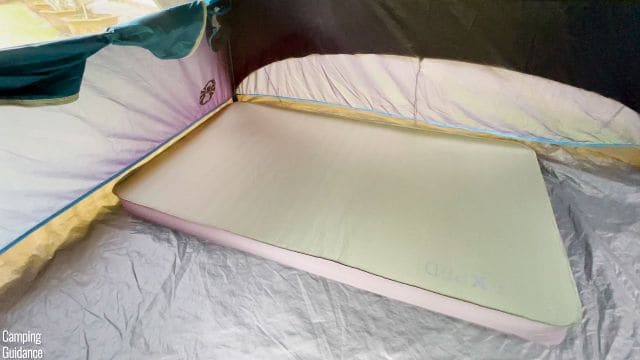 This is a picture of the Exped MegaMat Duo 10 inside a tent. It has dimensions of 73.5 by 42.5 inches.