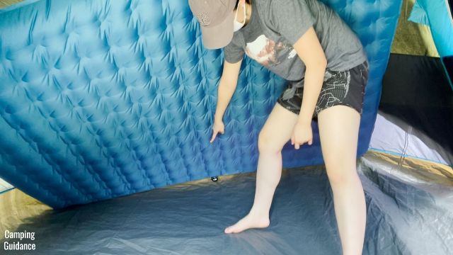 This is a picture of the bottom surface of the Alps Mountaineering Vertex Air Bed, and me pointing to the Boston valve.