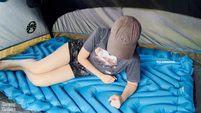 This is a picture of me on my elbow on the Klymit Double V Uninsulated Sleeping Pad.