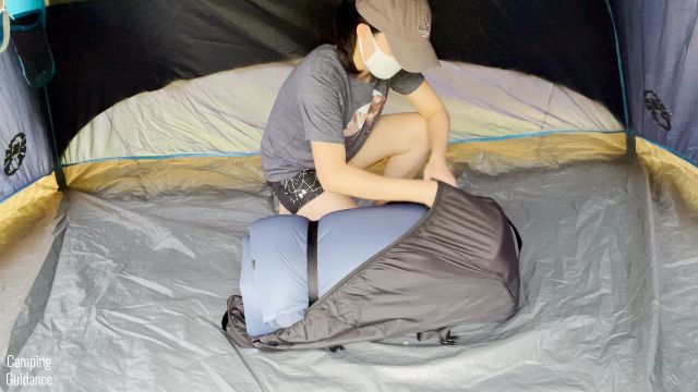 This is a picture of me taking out the REI Co-Op Camp Dreamer Double from its carry bag.