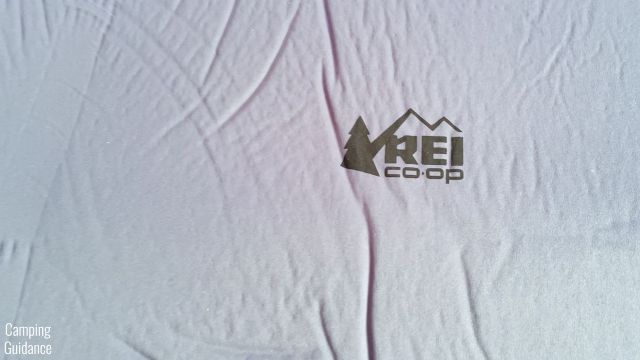 This is the logo of REI Co-Op on the REI Camp Dreamer Double.