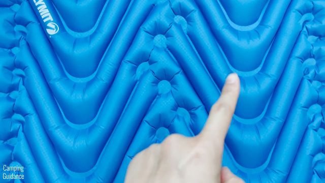 This picture shows that the V-shaped air chambers on the left and right of the Klymit Double V Uninsulated Sleeping Pad are not completely separate from each other.