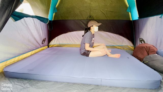This is a picture of me sitting down on the REI Camp Dreamer Double.