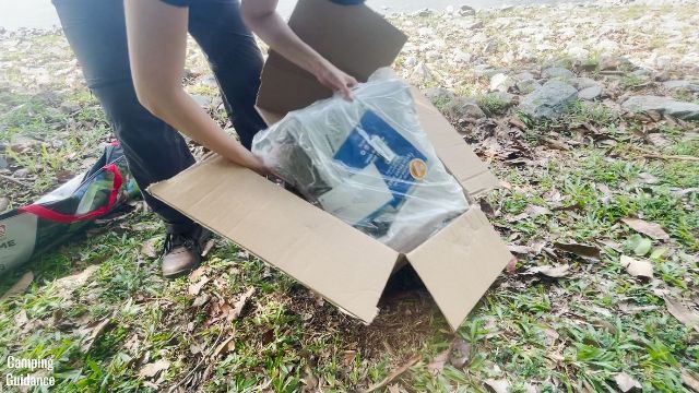 This is a picture of me taking out the Etekcity Upgraded Camping Mattress from the Amazon box.