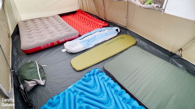 This is a picture of my Coleman WeatherMaster 10-Person Tent with 10 sleeping pads (a mix of 2 single, 3 double sleeping pads, and 1 full mattress) inside the tent.