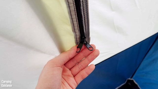 This is a picture of the 2 zippers that you will find on each window of the Ozark Trail 10-Person Cabin Tent.