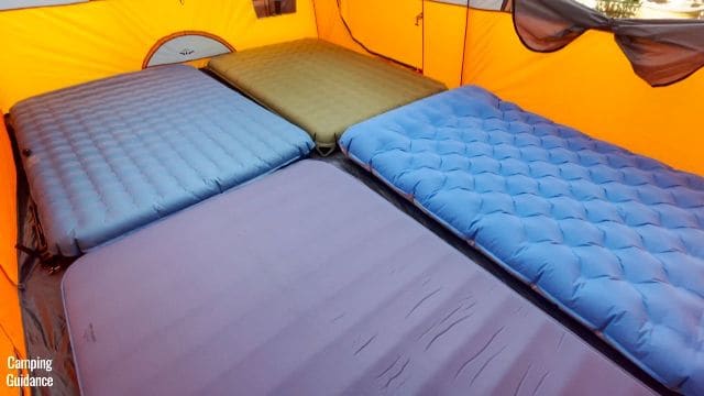 4 queen-sized camping mattresses in the Core Straight Wall Cabin 10