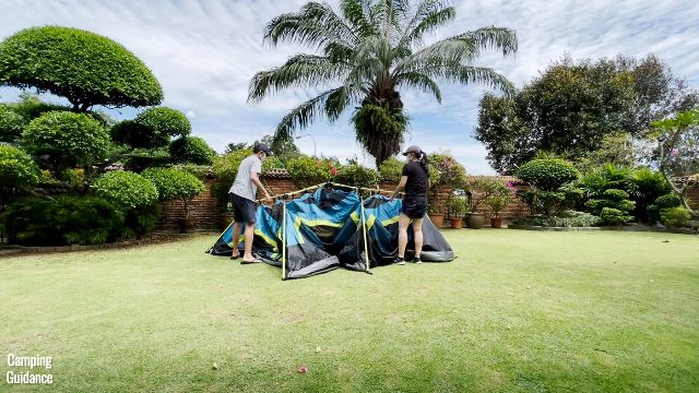 This is the Coleman 10-Person Instant Cabin Tent with its elbow joints propped up at about a 90-degree angle.