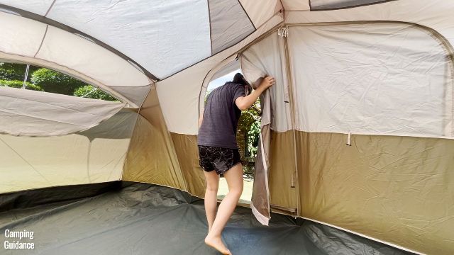 This is a picture of me ducking to get through the back door of the Coleman WeatherMaster 10-Person Tent.