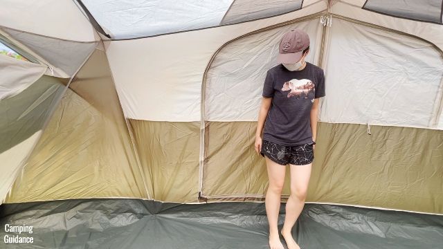 This is a picture of me standing in front of the back door of the Coleman WeatherMaster 10-Person Tent.