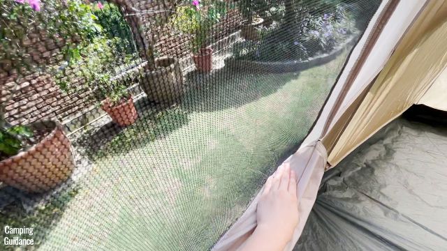 This is a picture of the bug net of one of the windows in the Coleman WeatherMaster 10-Person Tent.