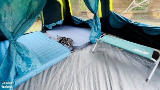 This is a picture of the room divider in the Coleman 10-Person Instant Cabin Tent, which has 2 queen-sized beds on one side of the divider.