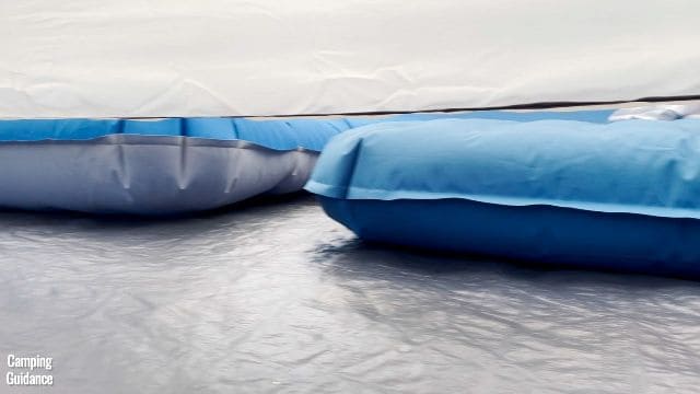 This is the gap at the bottom of the divider in the Ozark Trail 10-Person Cabin Tent.